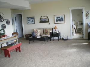 a living room with a couch and a table at Turtle Mountain Inn in Vernon