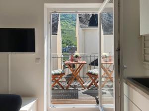 Et tv og/eller underholdning på Ferienhaus Ty Maya