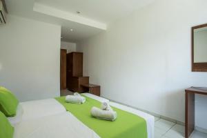Posteľ alebo postele v izbe v ubytovaní Olympia Sun Hotel