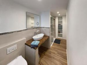 Et badeværelse på Ferienhaus Ty Maya + 29 billeder