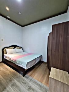 Postel nebo postele na pokoji v ubytování New koa condo hotel
