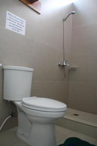 Koupelna v ubytování GHIELLANIQA INN