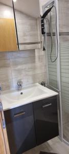 a bathroom with a sink and a shower at Villa Marija in Vir +53 photos