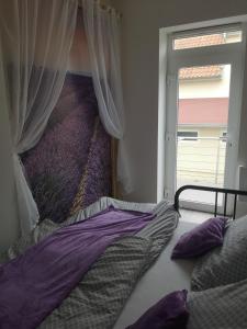 Postel nebo postele na pokoji v ubytování Apartmán U vody