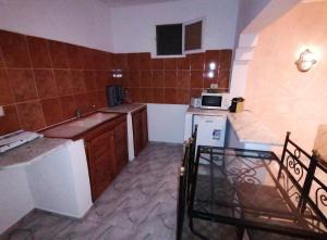Kuchyň nebo kuchyňský kout v ubytování Calma Maison de charme