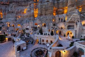 an aerial view of a building with a rock wall at Yunak Evleri Cappadocia in Urgup