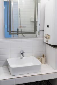 Kopalnica v nastanitvi Vimini Apartman