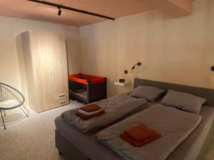 Postel nebo postele na pokoji v ubytování Guesthouse Sprinysem + 25 fotografií