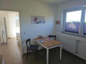 TV a/nebo společenská místnost v ubytování FeWo Lena + 7 fotografií