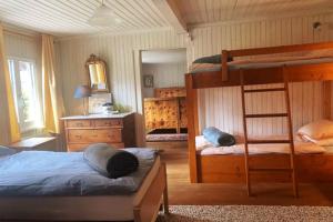 Postel nebo postele na pokoji v ubytování Wunderschönes Chalet Stöckli