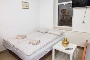 Postel nebo postele na pokoji v ubytování Charm apt-Sarajevo Center- Aircondition