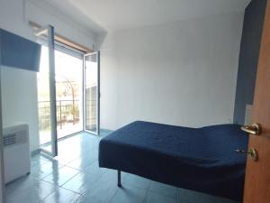 Postel nebo postele na pokoji v ubytování Room&Relax Scauri