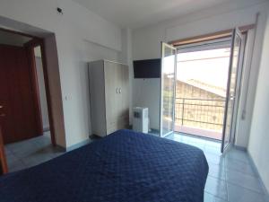 Postel nebo postele na pokoji v ubytování Room&Relax Scauri + 9 fotografií