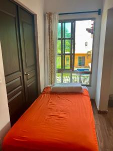 Postel nebo postele na pokoji v ubytování Cancun-Soho