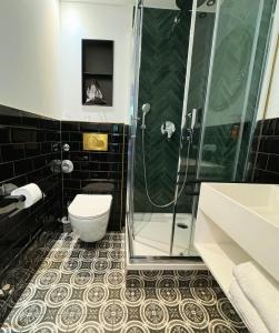 Koupelna v ubytování Midi Inn Parkhotel Mitte + 11 fotografií
