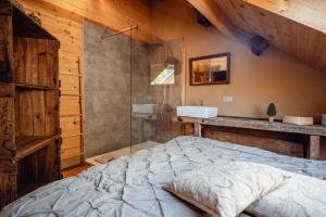 Postel nebo postele na pokoji v ubytování Les Gîtes de Sprimont - Le Cosy