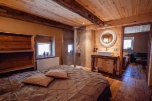 Postel nebo postele na pokoji v ubytování Les Gîtes de Sprimont - Le Cosy