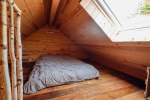 Postel nebo postele na pokoji v ubytování Les Gîtes de Sprimont - Le Cosy