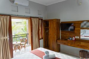 Postel nebo postele na pokoji v ubytování Dara House
