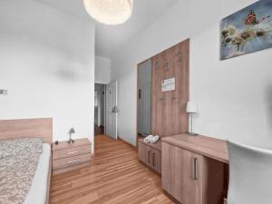 Voodi või voodid majutusasutuse Josef Wolfik strasse 10 Apartment toas