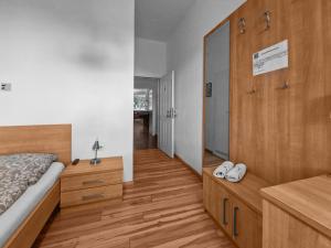 Voodi või voodid majutusasutuse Josef Wolfik strasse 10 Apartment toas