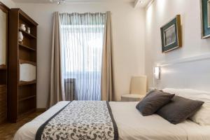 Posteľ alebo postele v izbe v ubytovaní Dulcis In Vatican b&b