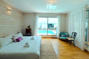 En eller flere senge i et værelse på L'insoupçonnée sur le port de Vannes + 59 billeder