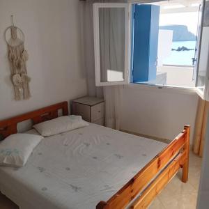 Postel nebo postele na pokoji v ubytování Porto Anafi + 19 fotografií