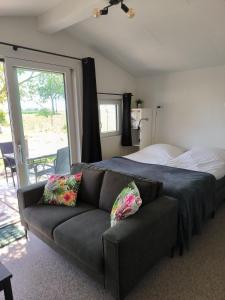 Postel nebo postele na pokoji v ubytování Mariafarm Chalets