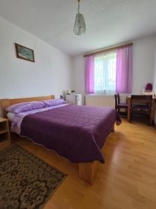 Postel nebo postele na pokoji v ubytování Guesthouse Milka