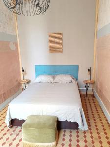 Postel nebo postele na pokoji v ubytování Casa monumental con encanto