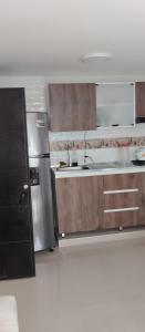 Kuchyň nebo kuchyňský kout v ubytování Hermoso apartamento amoblado