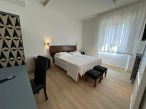 Postel nebo postele na pokoji v ubytování Domus Socolatae Cocoa Journey Tuscan Lifestyle B&B