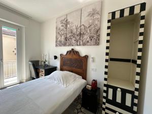Postel nebo postele na pokoji v ubytování Domus Socolatae Cocoa Journey Tuscan Lifestyle B&B