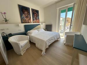 Postel nebo postele na pokoji v ubytování Domus Socolatae Cocoa Journey Tuscan Lifestyle B&B