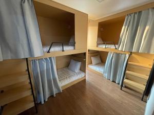 Una cama o camas en una habitación de K wave Guesthouse Only Female in Hongdae 1