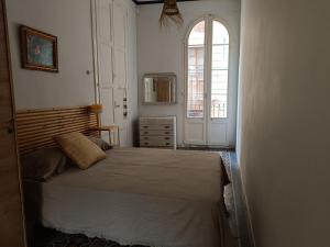Postel nebo postele na pokoji v ubytování Casa monumental con encanto