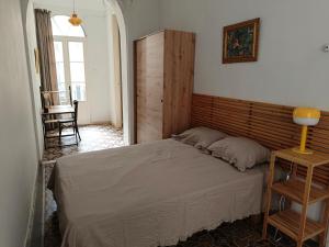Postel nebo postele na pokoji v ubytování Casa monumental con encanto