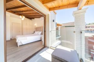Ένα ή περισσότερα κρεβάτια σε δωμάτιο στο Casa di Rozalia