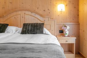 Postel nebo postele na pokoji v ubytování Hotel Pedranzini
