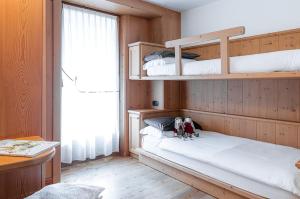 Postel nebo postele na pokoji v ubytování Hotel Pedranzini