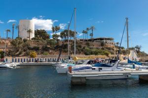 a group of boats docked in a marina at House in Orihuela Costa La Zenia in Orihuela