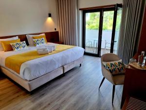 Postel nebo postele na pokoji v ubytování 3M Hostel & Suites