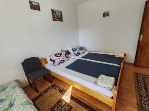 Postel nebo postele na pokoji v ubytování Apartmani Vodice