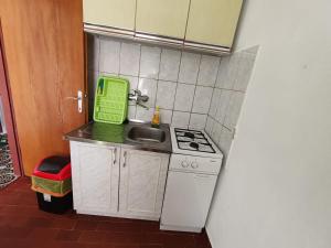 Kuchyň nebo kuchyňský kout v ubytování Apartmani Vodice