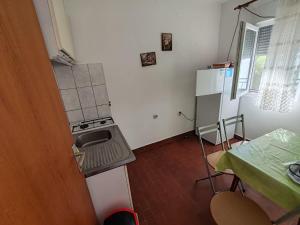 Postel nebo postele na pokoji v ubytování Apartmani Vodice