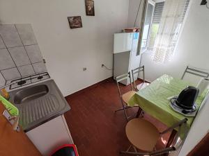 Kuchyň nebo kuchyňský kout v ubytování Apartmani Vodice