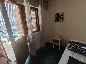 Postel nebo postele na pokoji v ubytování Apartmani Vodice