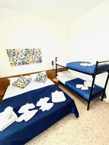 Rúm í herbergi á Hotel Staccoli