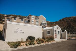 a building with the words ben vim horizons written on it at Baydream Away in Cape Town